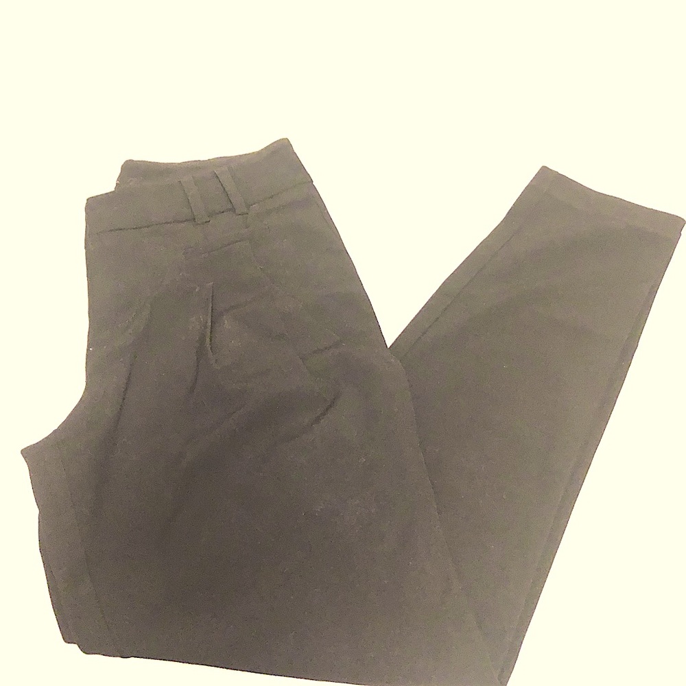 Black guess pants by guess jeans.